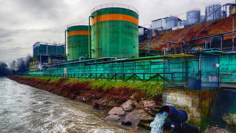 Understanding the Causes of Industrial Pollution