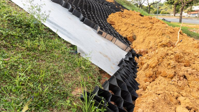 How Are Drainage Solutions Used to Manage Erosion from Stormwater?