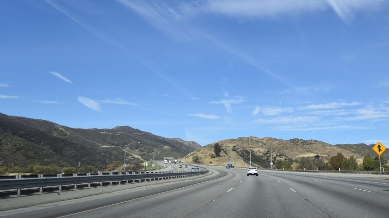 How Do Freeways and Motorways Differ from Other Road Classes?